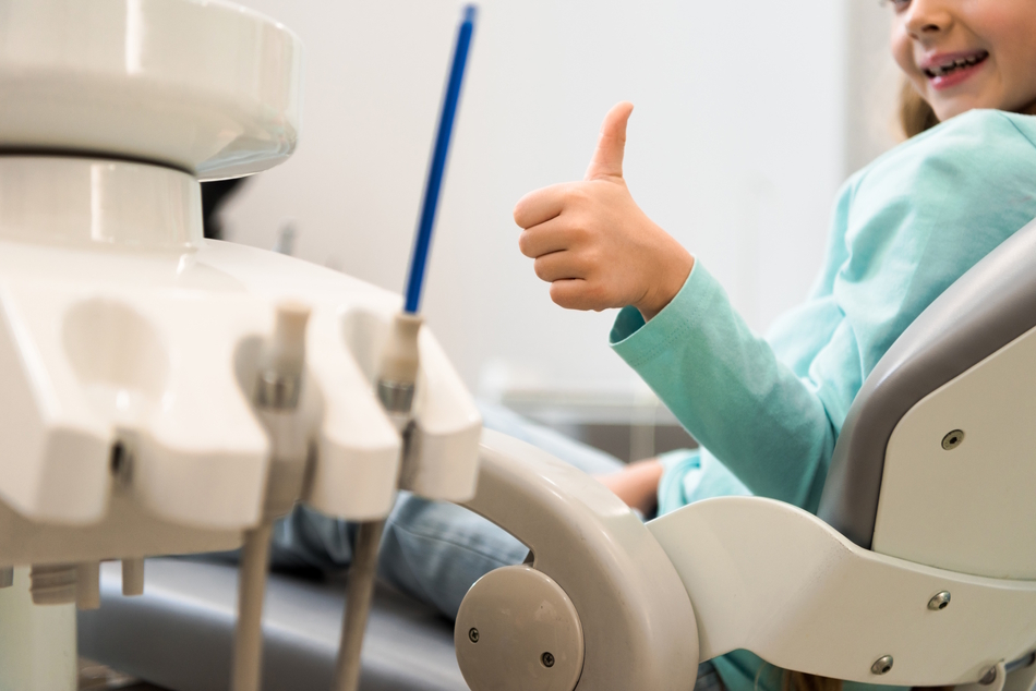 Cropped shot of little child sitting in dental cha 2023 11 27 05 13 28 utc